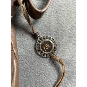 Sak‎ leather purse